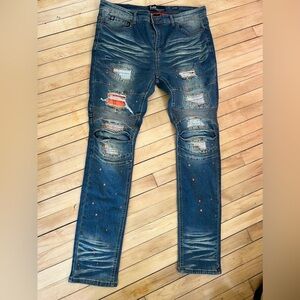 Switch Remarkable slim tapered distressed splatter jeans